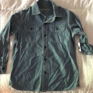 Boys size medium denim button down shirt.  NWT